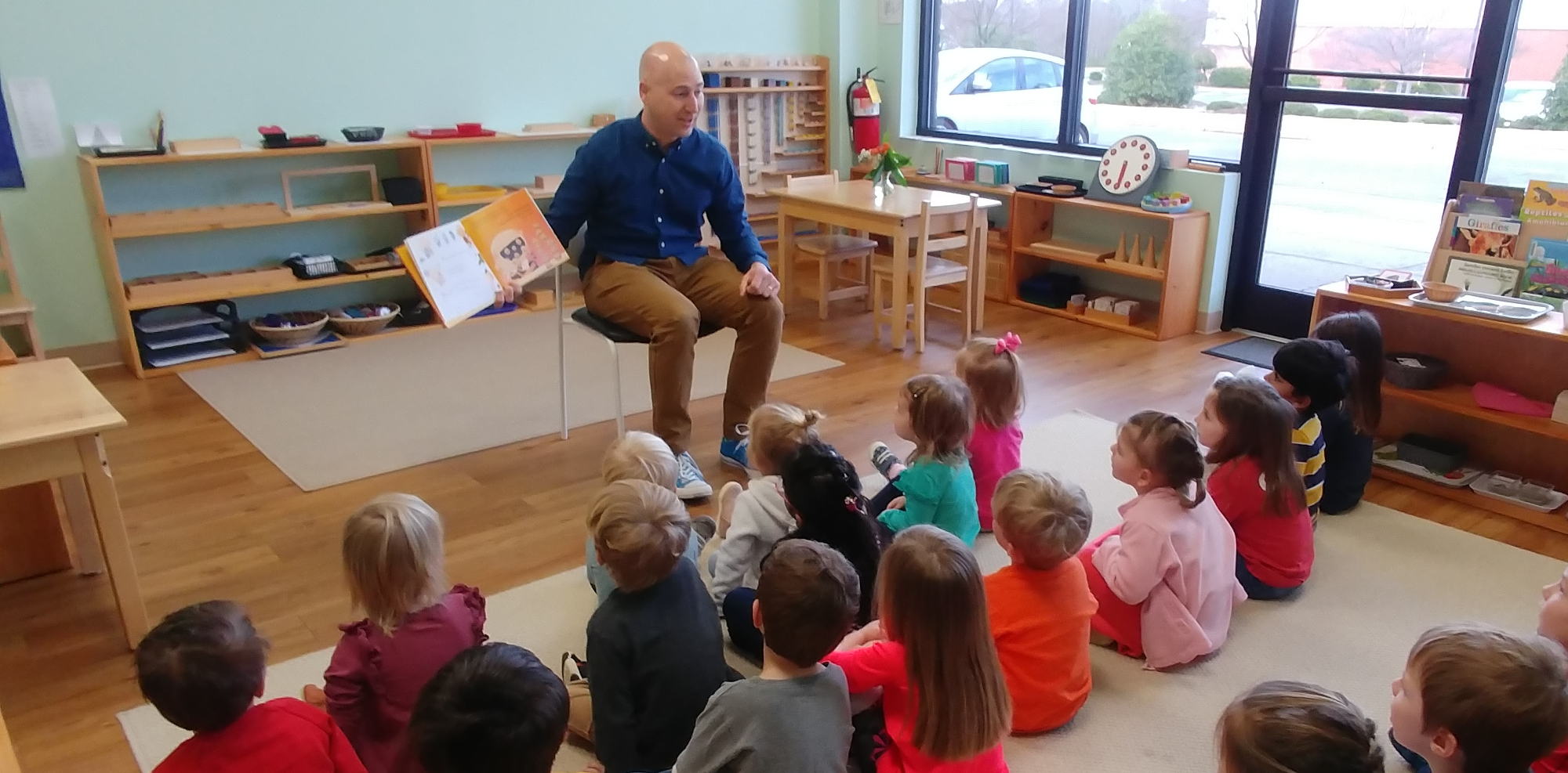 Photo of me reading to a preschool class